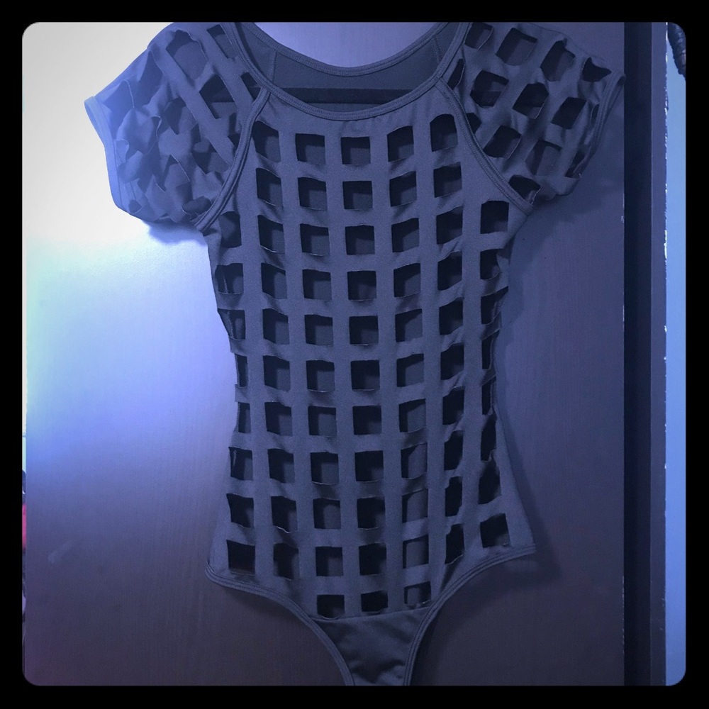 Black bodysuit. Mesh net on front. Size small.